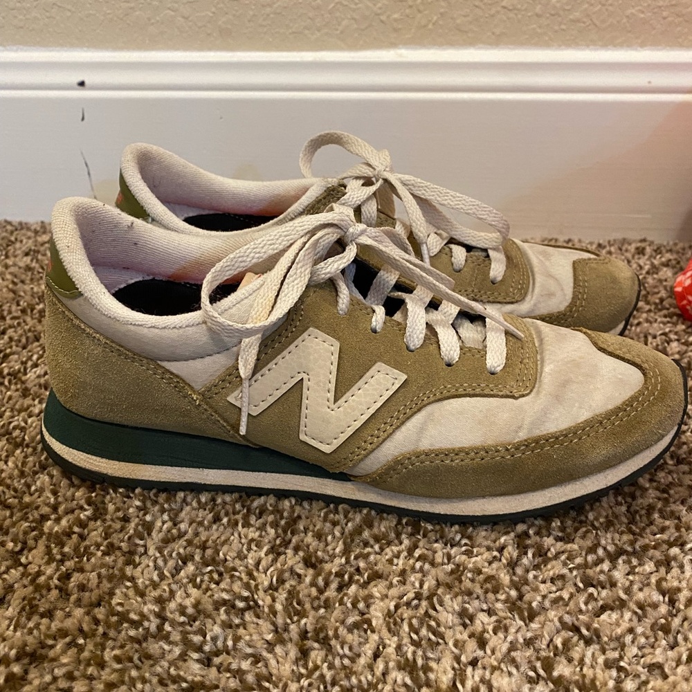 Green and tan new balance sneakers/tennis shoes